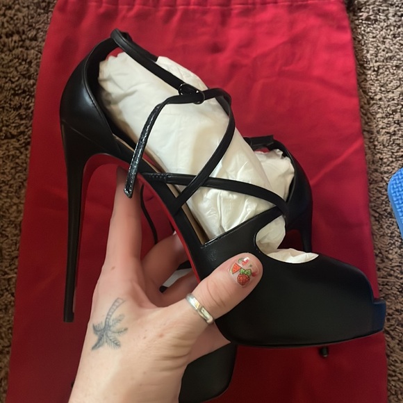 Christian Louboutin red bottom heels. - Picture 4 of 11